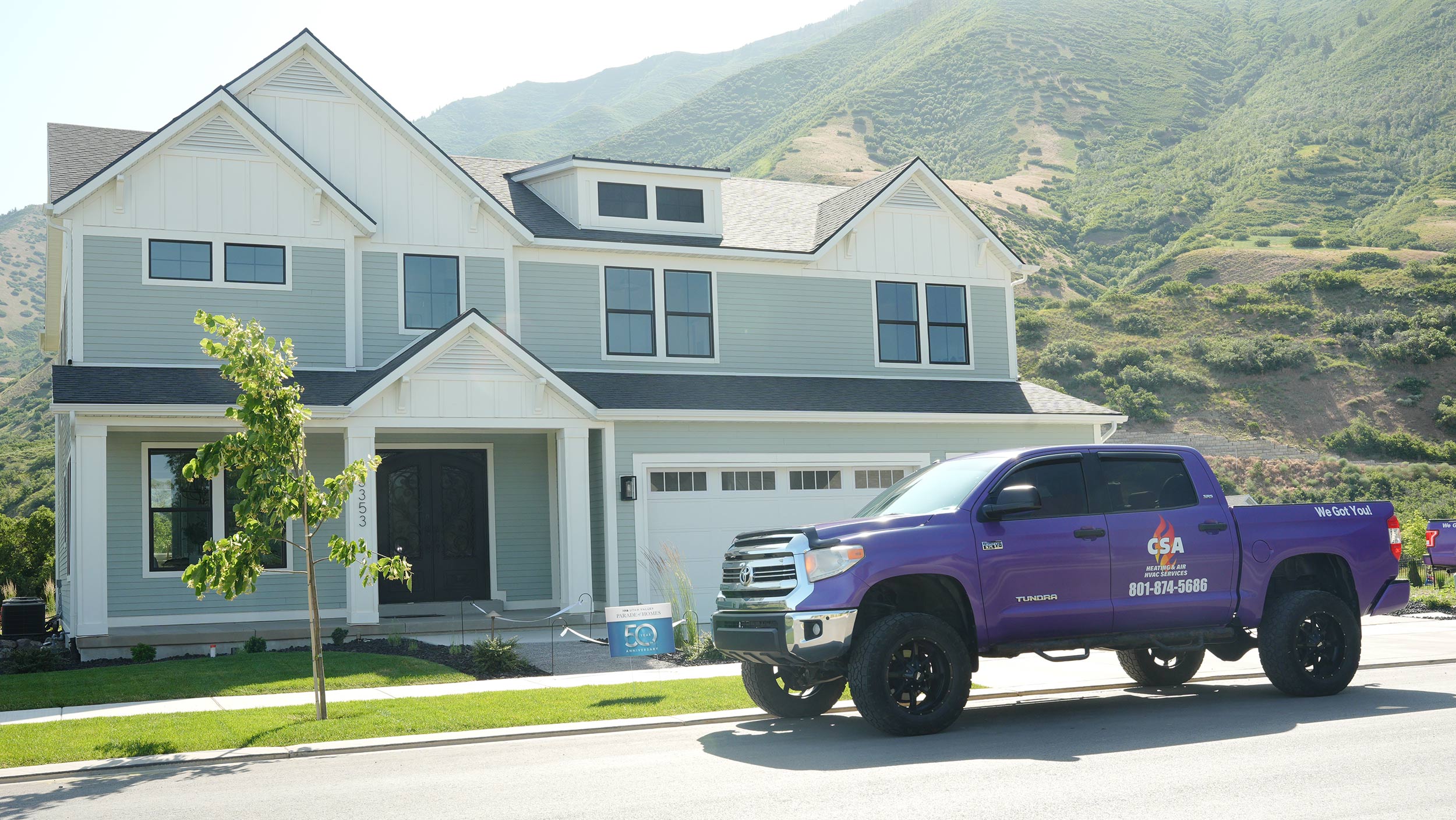 csa-heating-and-air-truck-in-front-of-house